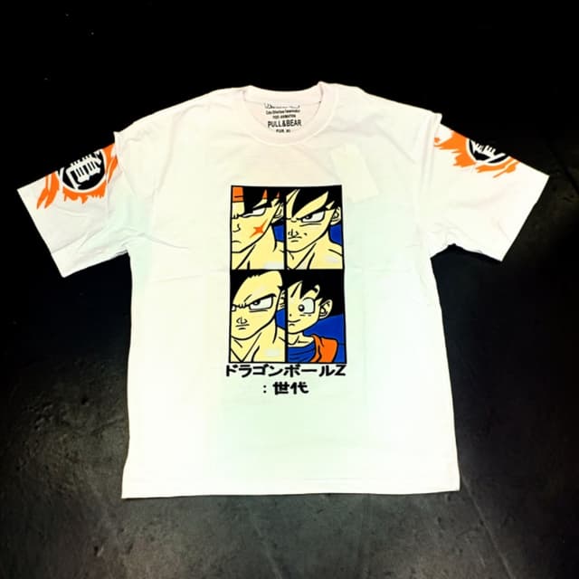 White, orange, black, blue, and yellow T-shirt
