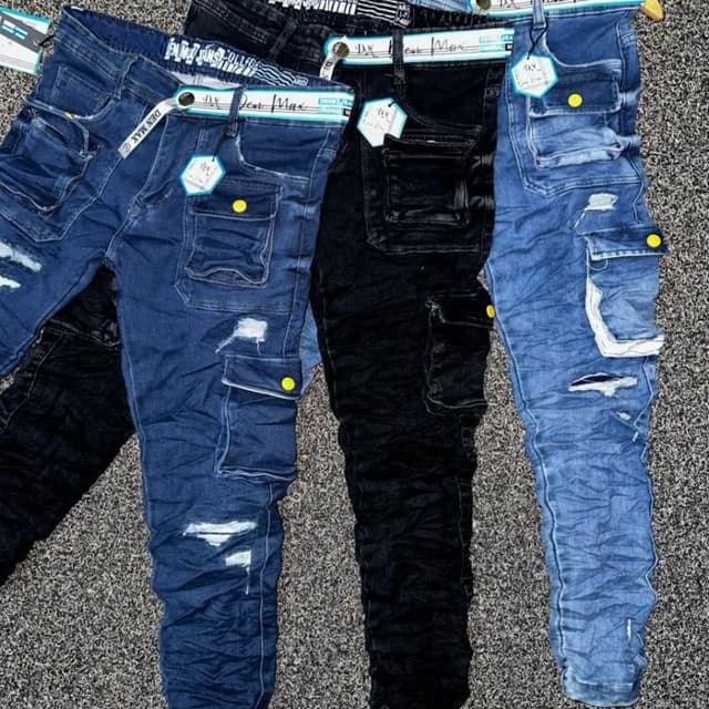 Various shades of blue, black, and possible white accents Jeans