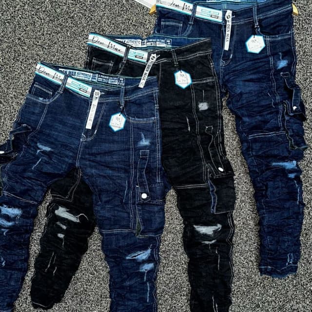 Various shades of blue and black denim Jeans