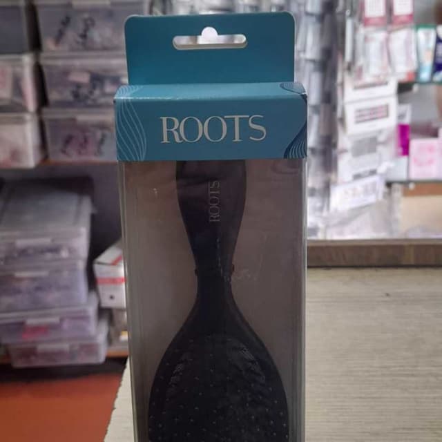 Black, Teal, White Hair Brush