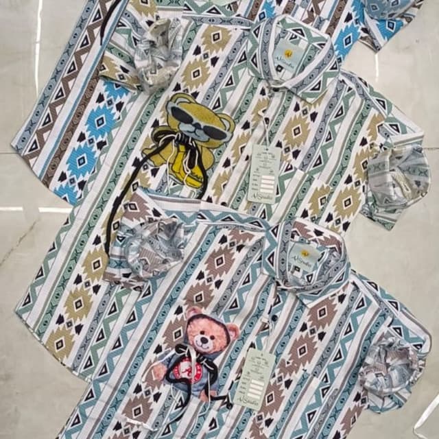 Multicolor, featuring shades of white, brown, blue, green, and a touch of yellow and pink Shirt