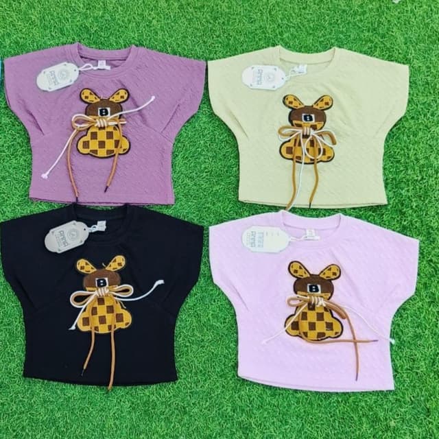 Various pastel colors including purple, yellow, black, and pink with brown and gold accents T-shirt