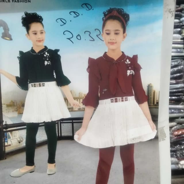 Black and White with accent colors of maroon/burgundy Dress