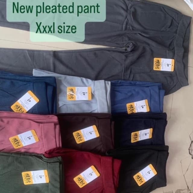 Various solid colors including gray, blue, pink, brown, black, maroon, and green. Pleated Pants