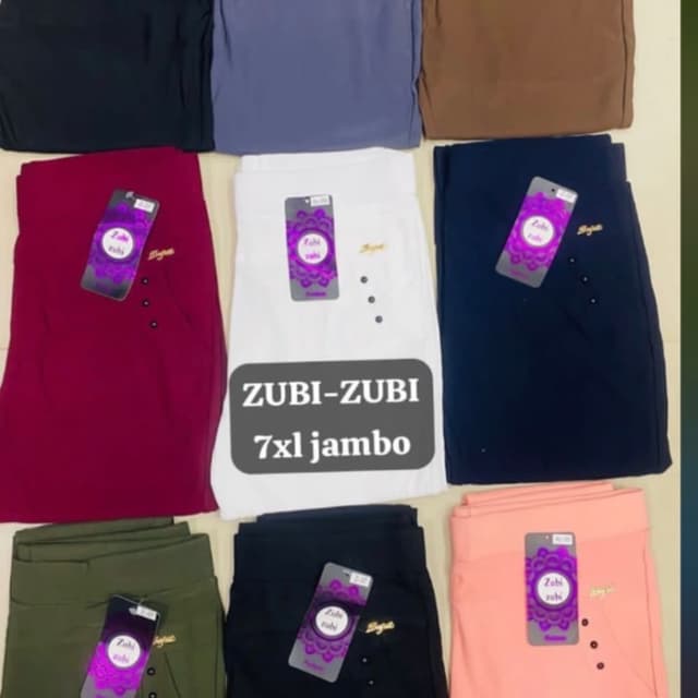 Variety of solid colors including white, black, burgundy, navy blue, olive green, peach, brown, and a muted purple/blue. Pants