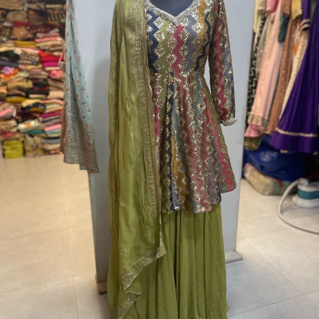 Multicolor with shades of green, blue, pink, and gold. Sharara Suit