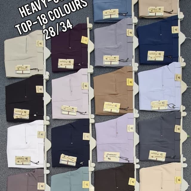Variety of solid colors including beige, maroon, grey, blue, black, white, and others. Trousers