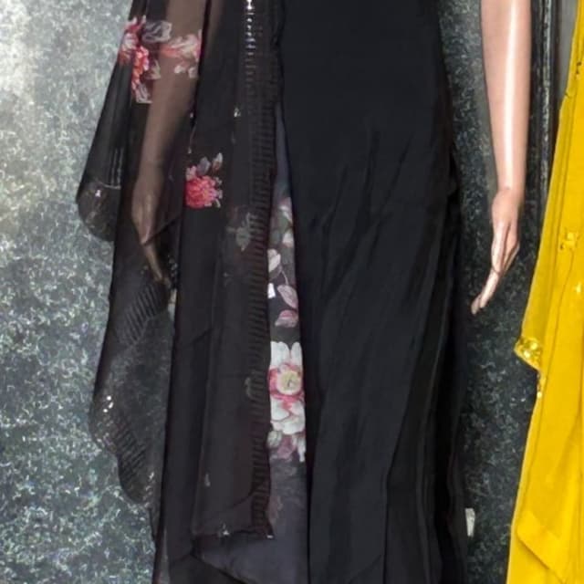 Black with floral accents (pink, white, and green) Salwar Suit