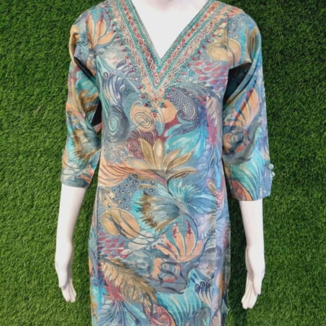 Blues, greens, beige, and a touch of red Kurti