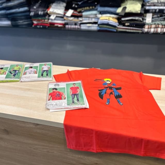 Red, with black, blue, and yellow accents T-shirt