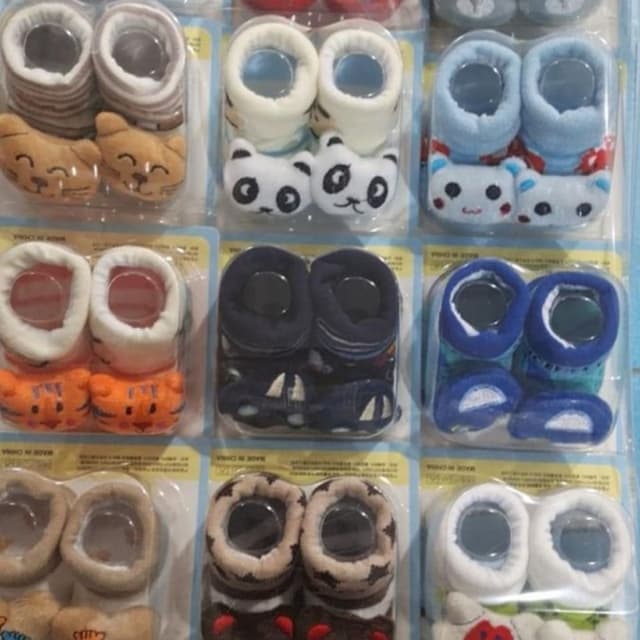 Various, including white, blue, orange, brown, and navy Baby Socks