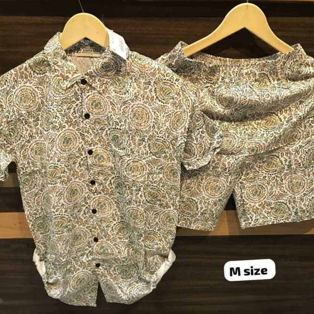 White, with a pattern of green and yellow Shirt and Shorts Set