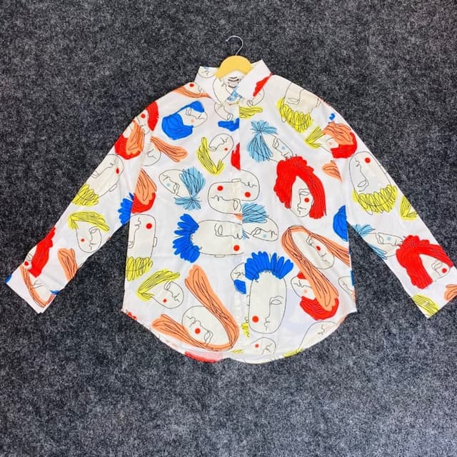 White with a multi-colored abstract design featuring red, blue, yellow, and orange Shirt