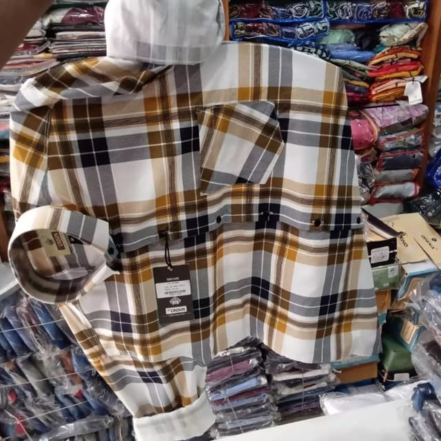 White, Black, Brown, Yellow Shirt