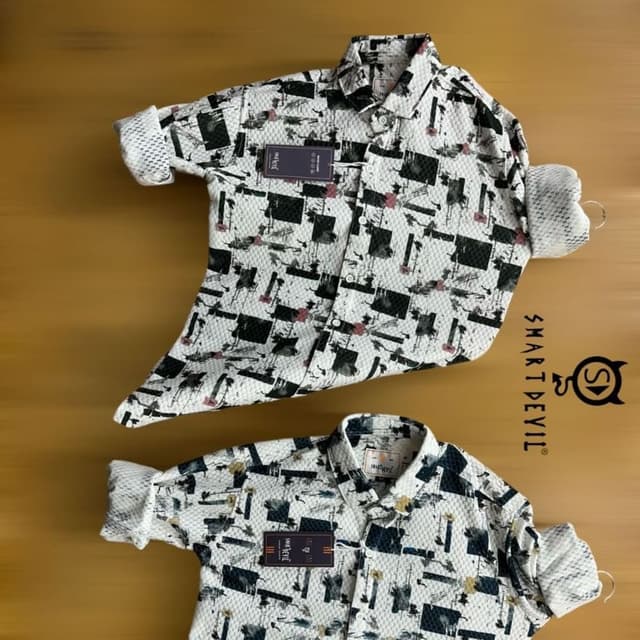 White, Black, Gray, and touches of Pink and Yellow Shirt