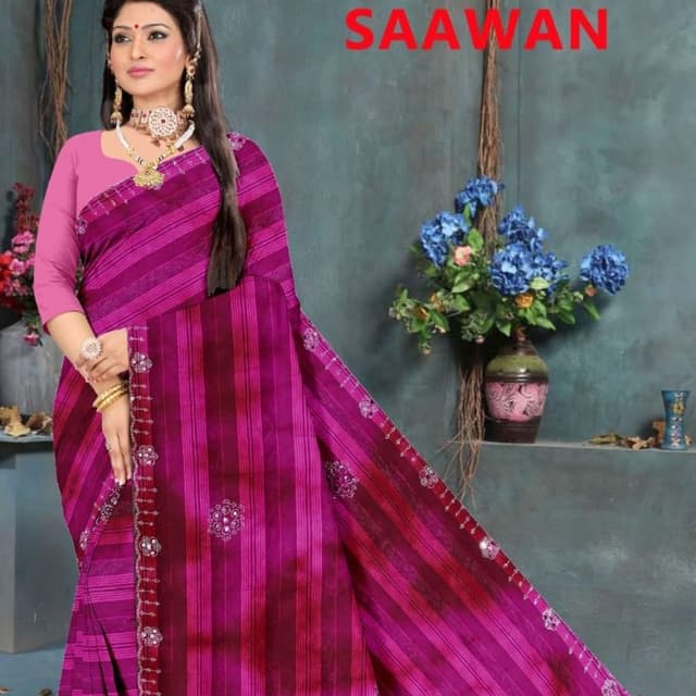 Shades of pink and magenta, with a contrasting pink blouse. Saree