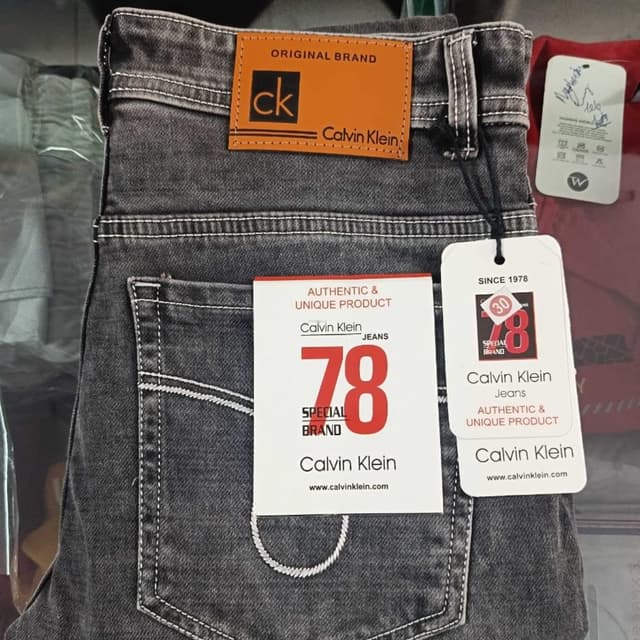 Charcoal gray with white stitching Jeans