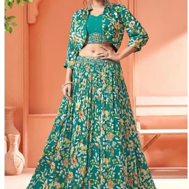 Green, with floral patterns in yellow and orange Lehenga Choli