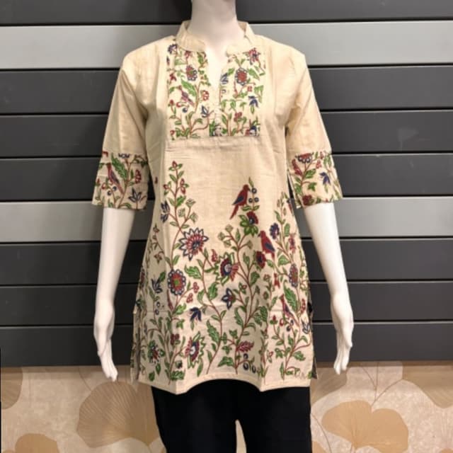 Beige, with multi-colored floral and bird motifs (red, green, blue, maroon) Tunic