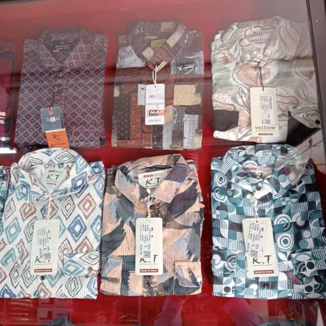 Various patterns, including blues, greens, browns, and beige with geometric and abstract designs. Shirt