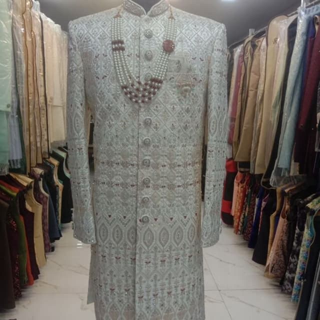 Ivory, silver, and burgundy accents Sherwani