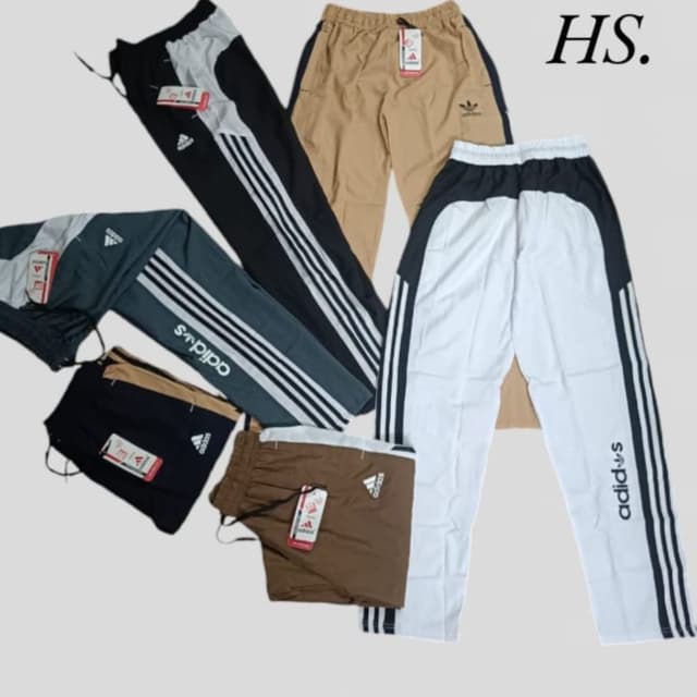 Various, including black, white, gray, beige, and brown with white or contrasting accents Track Pants