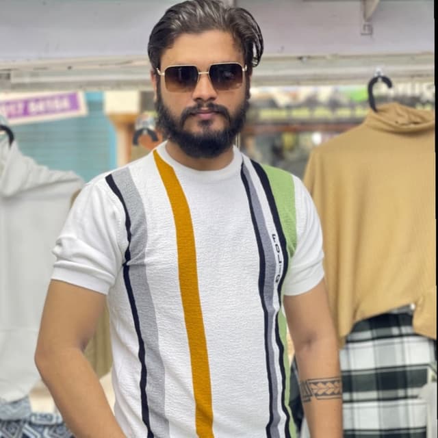 White, with vertical stripes in black, grey, yellow, and green T-shirt