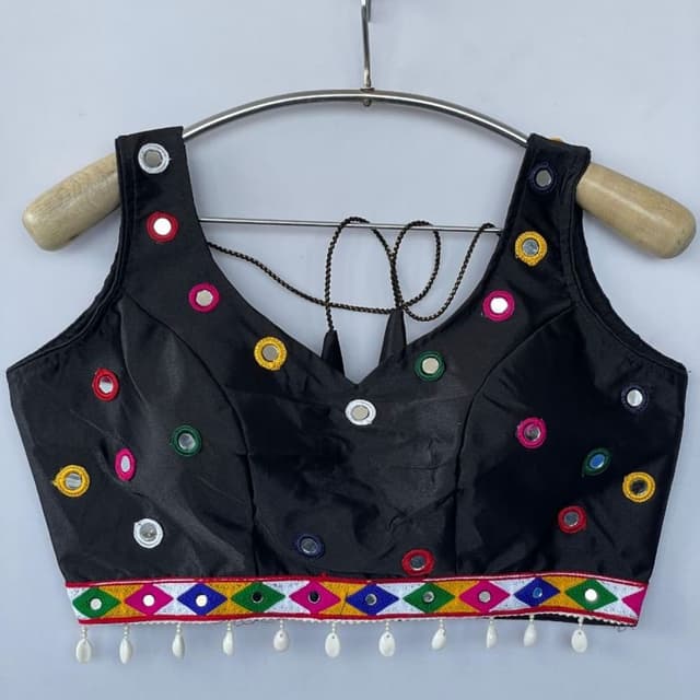 Black with multicolored accents (red, green, yellow, pink, blue, white) Blouse
