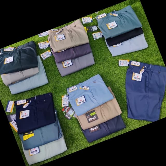 Various solid colors including navy blue, light blue, beige, grey, and teal Pants