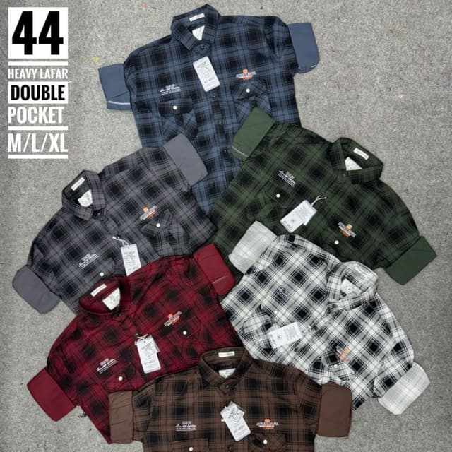 Various plaid patterns in blue, green, gray, red, brown, and white. Shirt