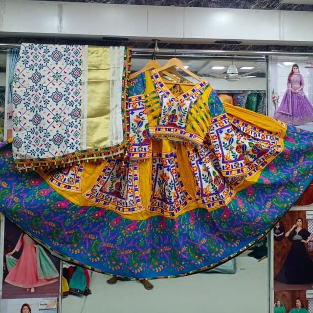 Yellow, Blue, White, and accents of Red, Green, and Gold Lehenga Choli with Dupatta