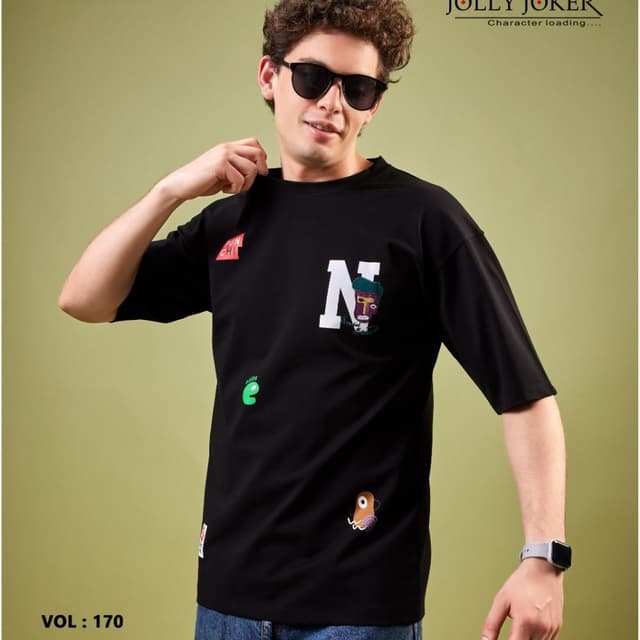 Black with white, green, and various other colors in the patches T-shirt