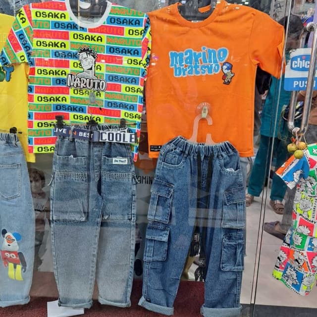 Various, including orange, blue, white, and multicolored prints. T-shirts and Jeans