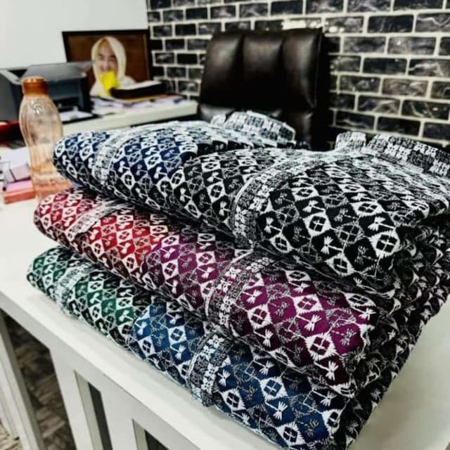 Various, including black and white, red, purple, green, and blue with white accents. Shirts