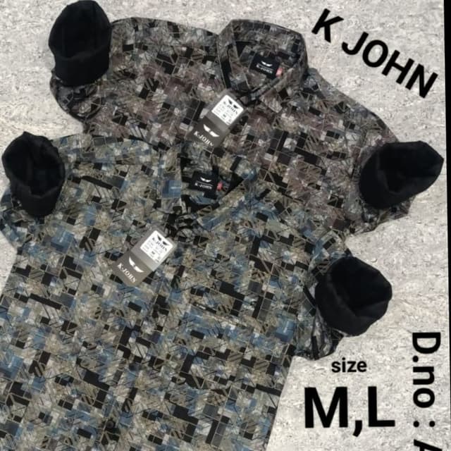 Black, brown, gray, and blue with a geometric pattern. Shirt