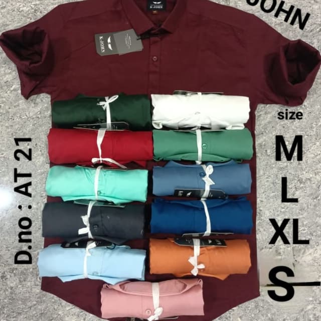 Variety of solid colors including maroon, dark green, red, teal, black, light blue, orange, and pink. Shirt