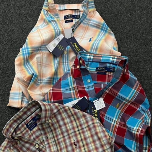 Various plaid patterns with colors like orange, blue, red, and brown. Shirt
