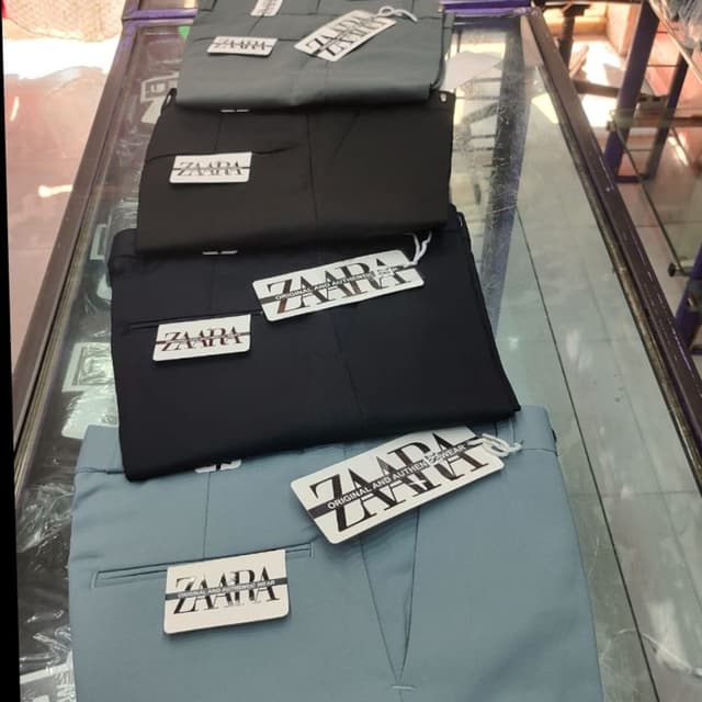 Various solid colors including gray, black, and light blue Trousers