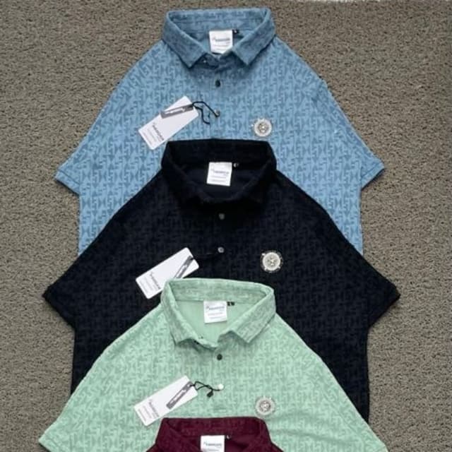 Various pastel colors including light blue, black, mint green, and maroon with a repeating pattern in a lighter shade of the base color. Polo Shirt