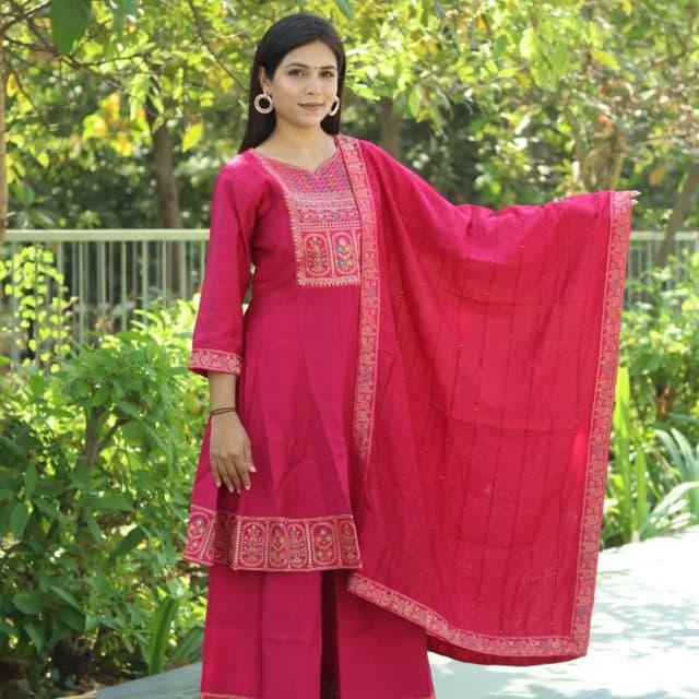 Magenta, with accents of gold, red, and cream in the embellishments Salwar Kameez with Dupatta