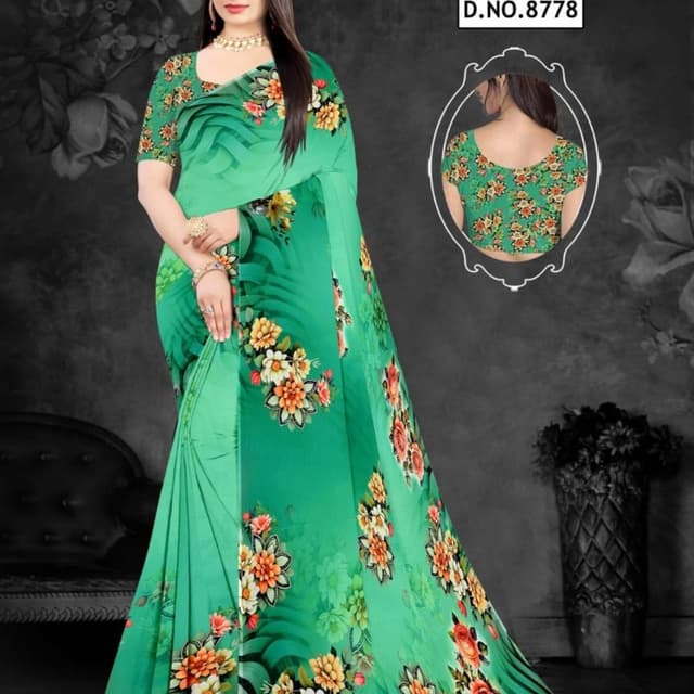 Green with floral accents in orange, yellow, and white Saree