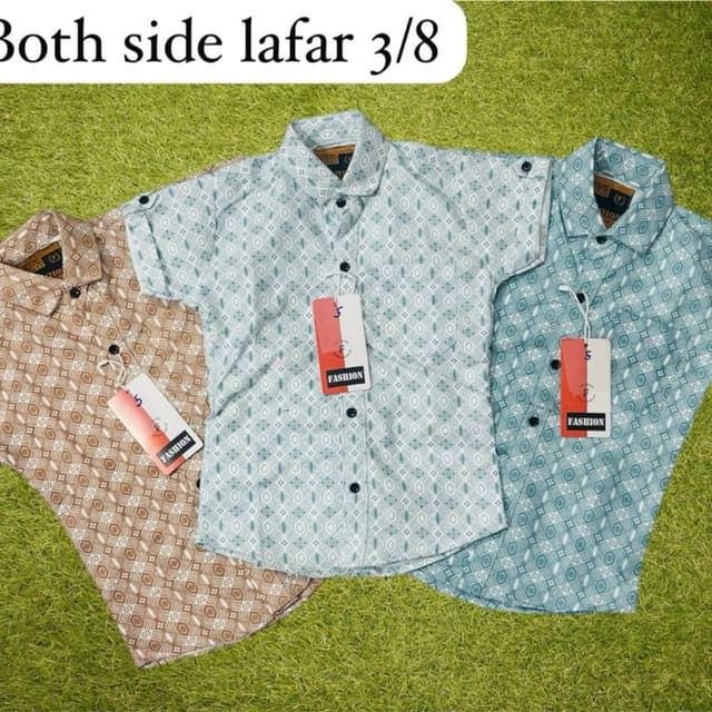 Various shades of brown, light blue and teal Shirt