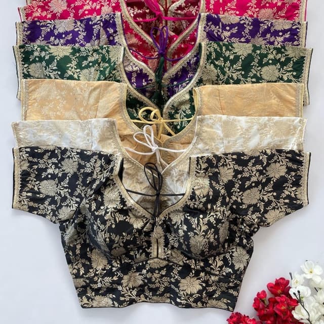 Variety of colors including black, gold, green, purple, pink, and ivory. Blouse