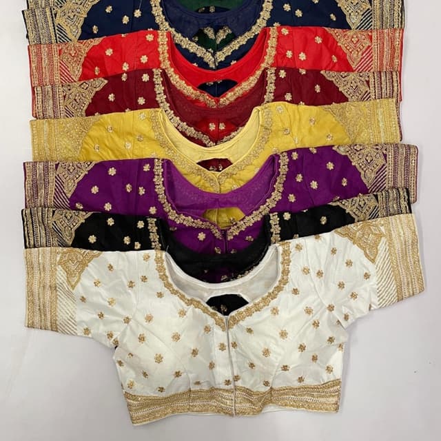 Variety of colors including white, black, purple, yellow, maroon, red, and navy blue with gold accents. Blouse
