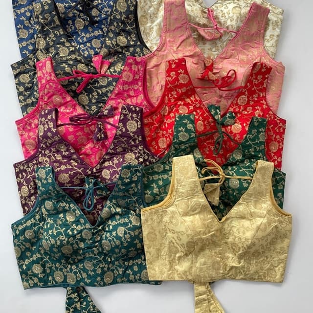 Various, including Black with Gold, Pink with Gold, Red with Gold, Green with Gold, Purple with Gold, and Cream with Gold Blouse