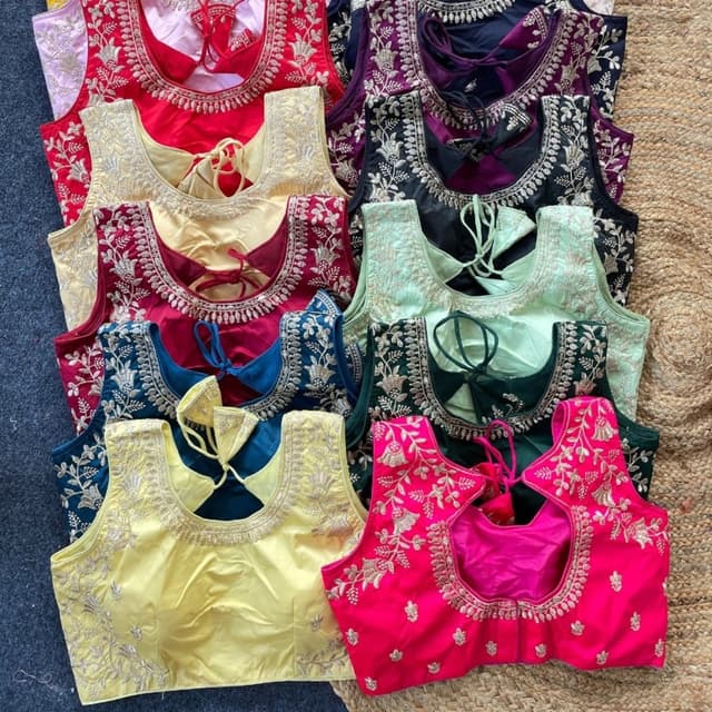 Various, including red, yellow, pink, blue, green, and purple, with gold embroidery Blouse