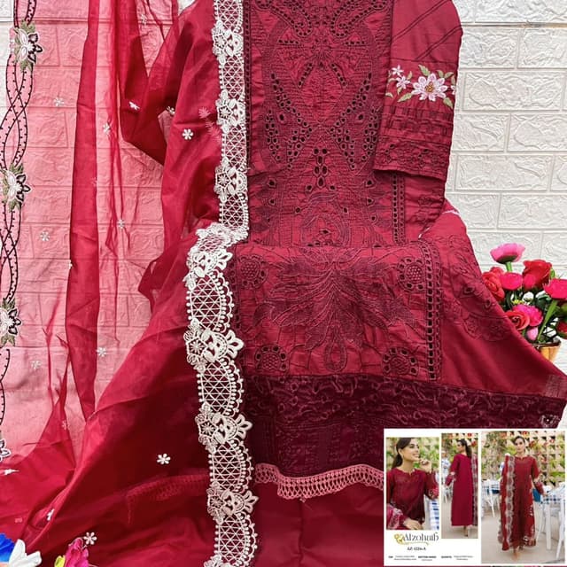 Shades of Red with White and Cream accents Salwar Kameez Suit