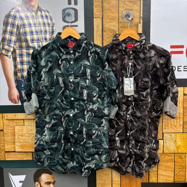 Green and Black with white accents, also available in a Brown color pallete. Shirt