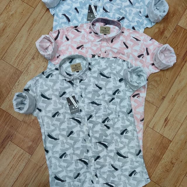 Various pastel colors including light blue, pink, and grey, with black and white accents. Shirt