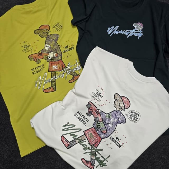 Various - Yellow, Black, and White with multi-colored graphic prints T-shirt
